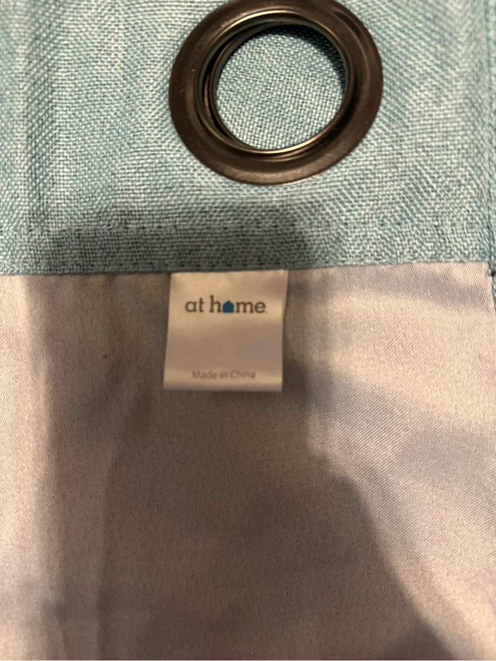At home light blue curtains